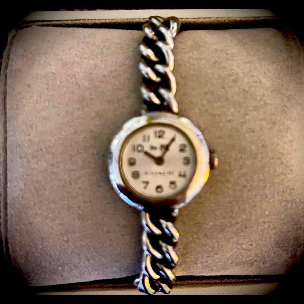 Ladies authentic Coach watch. Stainless